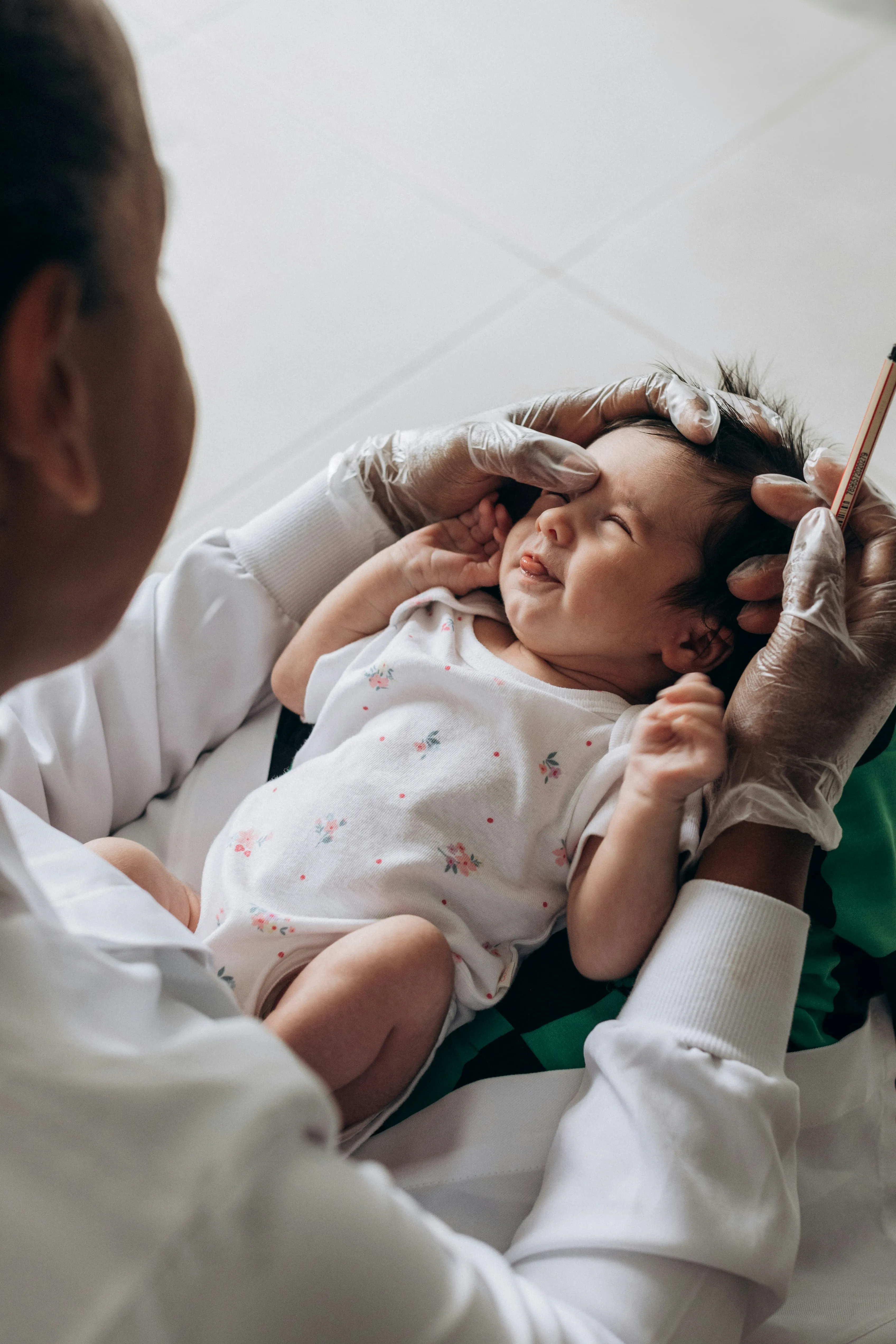 Doctor examining child