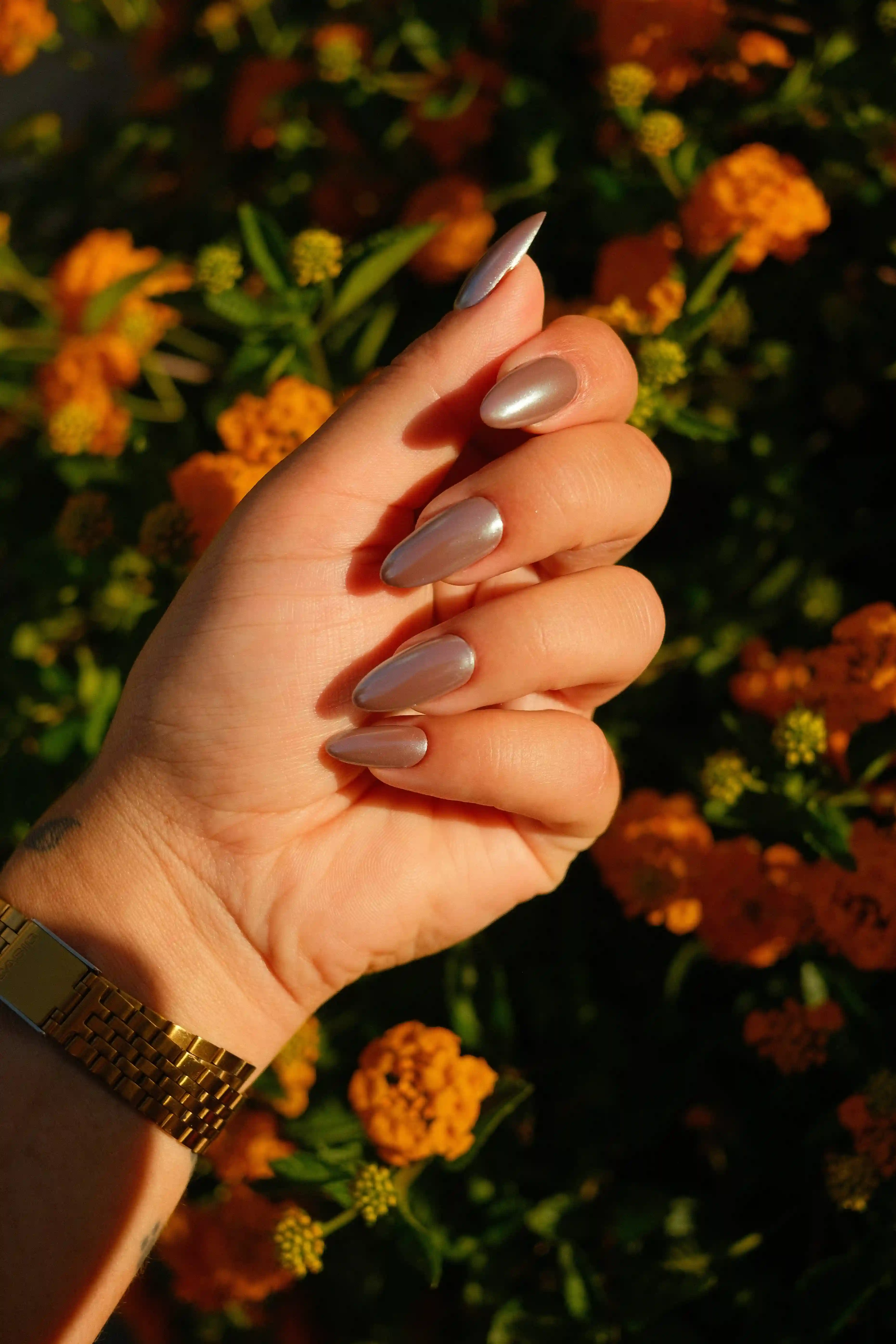 Modern gel nails with custom chrome details