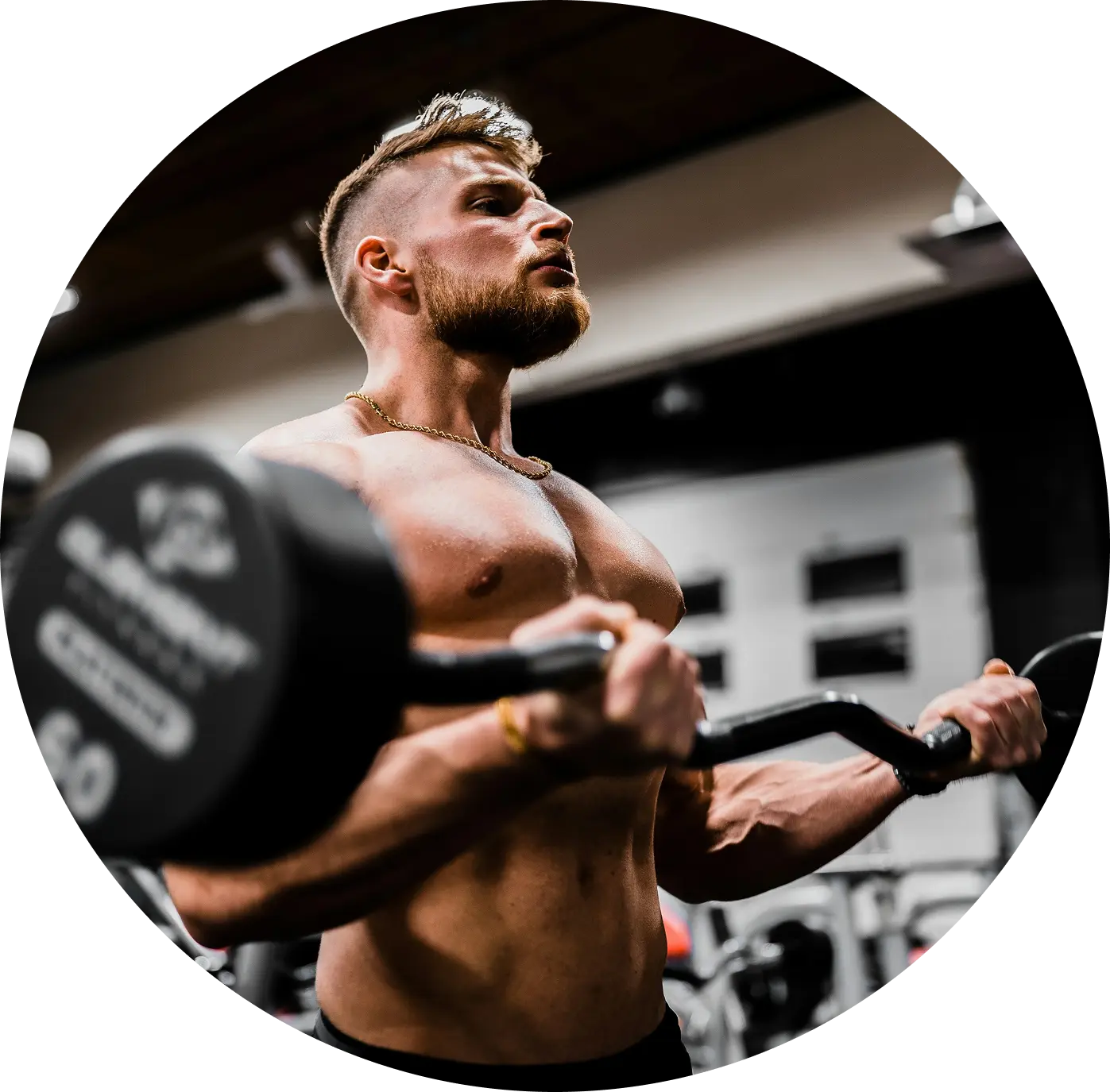  Athlete Curling Weight in Dark Gym