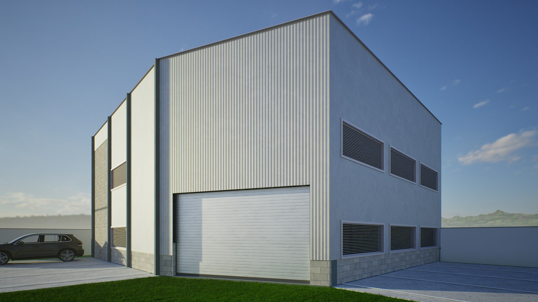 Modern metal-clad industrial manufacturing building with a large loading door