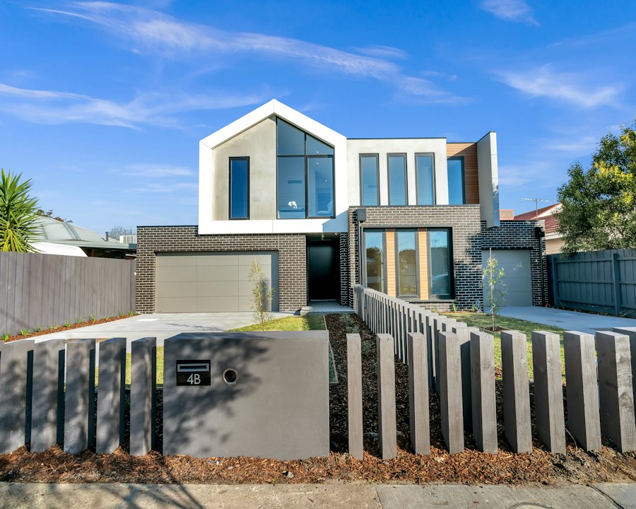 Rohit Varma’s development: contemporary gabled homes with timber and charcoal detailing